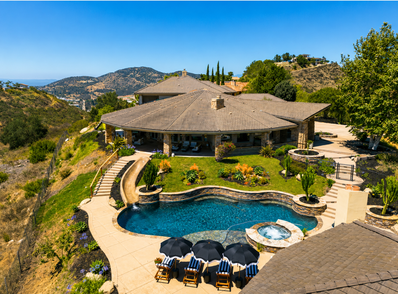 Vine & Sea Estate at sunset overlooking vineyards and the Pacific Ocean
