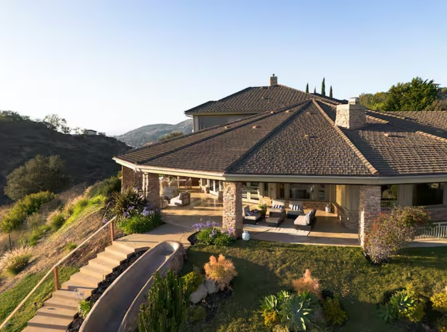 Mediterranean estate exterior with vineyards